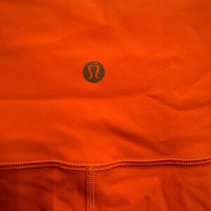 Orange Lululemon leggings (full length)